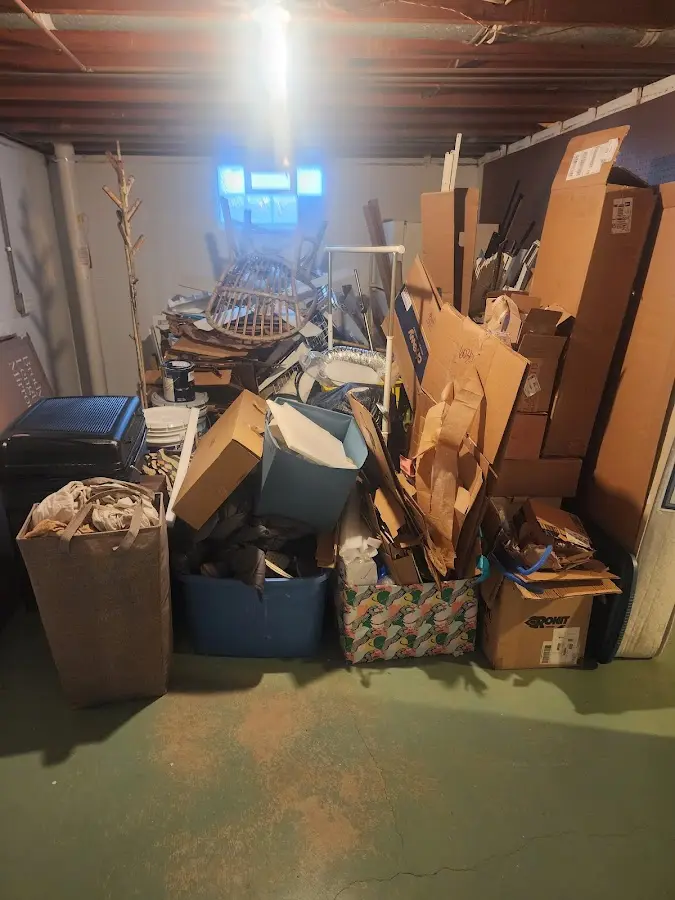 Roll-off dumpster container at job site for 8 Yard Dumpster Rental in North Fort Lewis